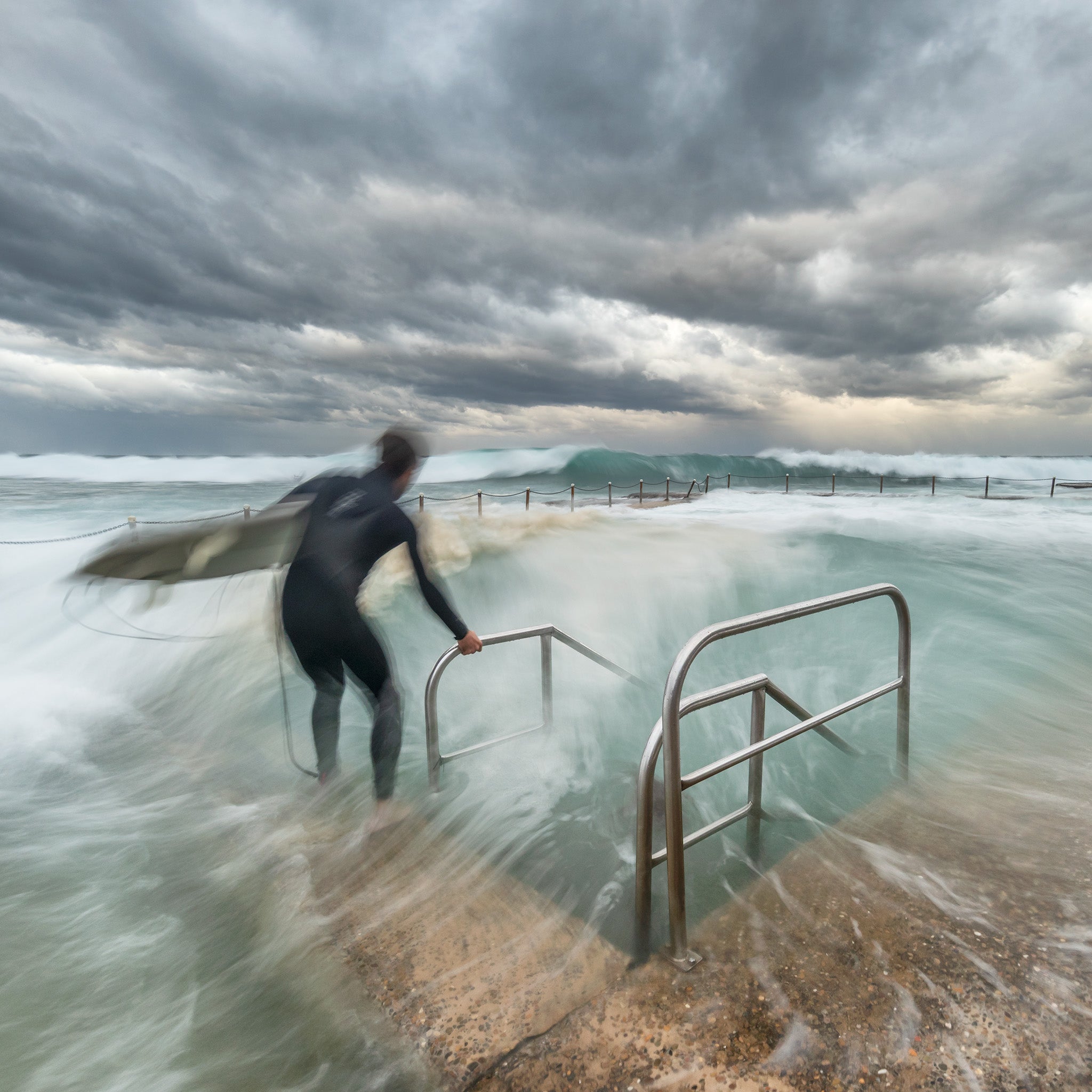 Coastal fine art print - photograph of a surfer at Avalon Rockpool, NSW