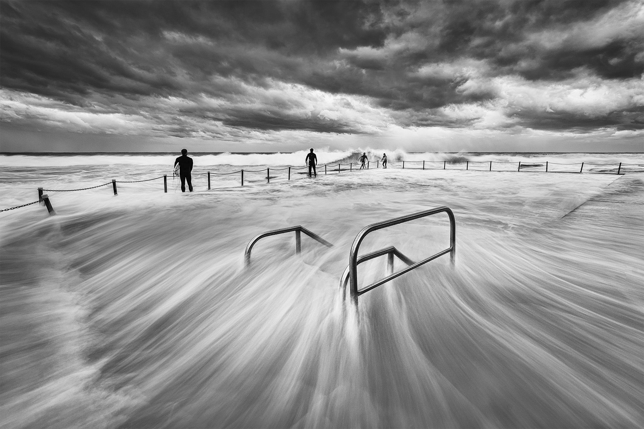 Coastal fine art print - photograph of surfers at Avalon Rockpool, NSW