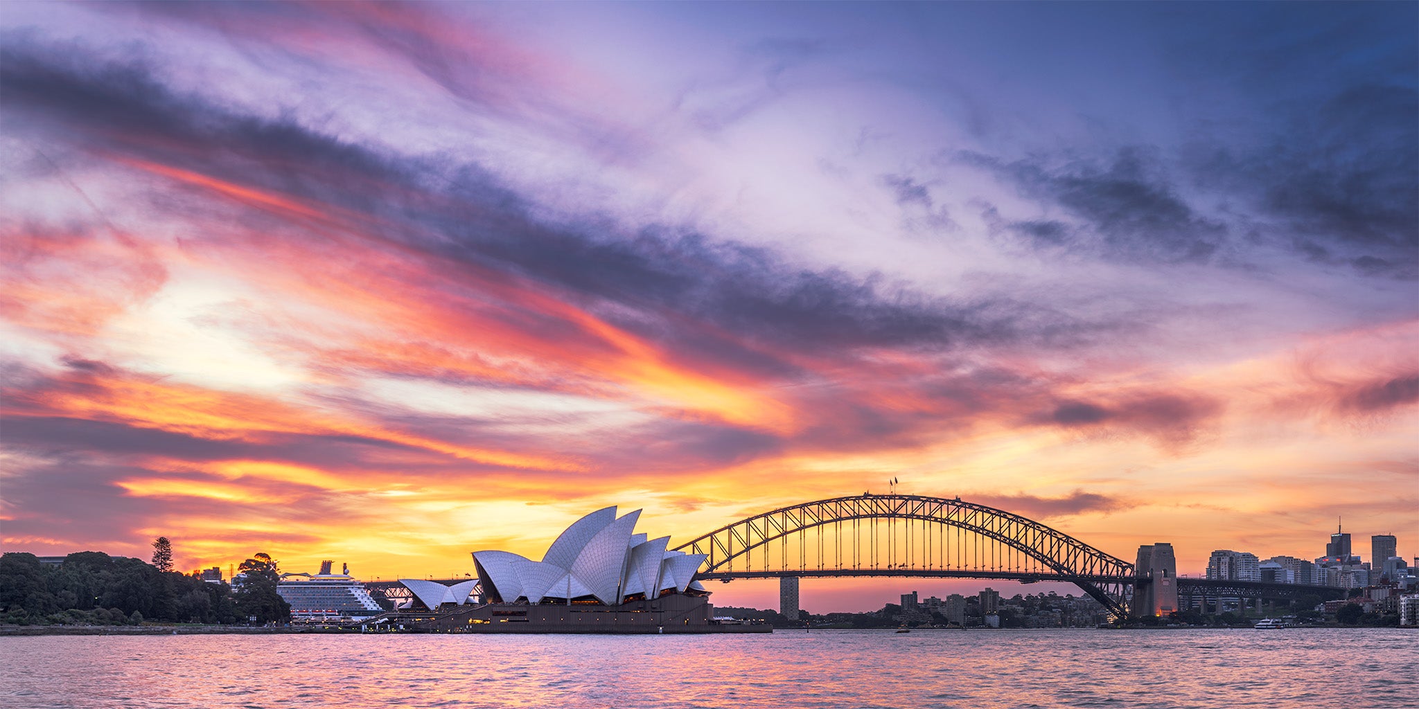 Urban fine art print - sunset photograph of Sydney Opera House and Harbour Bridge from Mrs Macquarie's Chair
